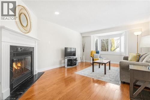 5480 Glen Erin Drive Unit# 94, Mississauga, ON - Indoor Photo Showing Living Room With Fireplace
