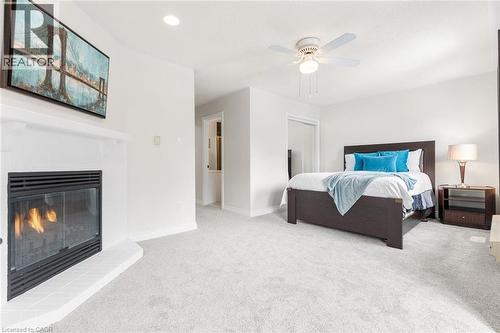 5480 Glen Erin Drive Unit# 94, Mississauga, ON - Indoor Photo Showing Bedroom With Fireplace