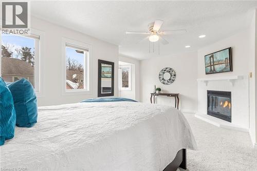 5480 Glen Erin Drive Unit# 94, Mississauga, ON - Indoor Photo Showing Bedroom With Fireplace