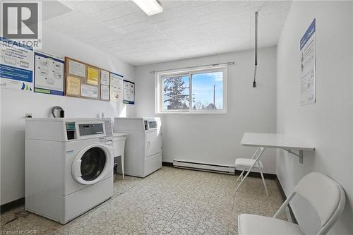 Coin laundry room for owners - 6 Walton Avenue Unit# 310, Kitchener, ON - Indoor Photo Showing Laundry Room