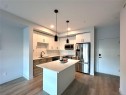 210-2465 Gateway Rd, Langford, BC  - Indoor Photo Showing Kitchen With Stainless Steel Kitchen With Upgraded Kitchen 