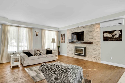 Salon - 661 Ch. St-Germain, Prévost, QC - Indoor Photo Showing Living Room With Fireplace