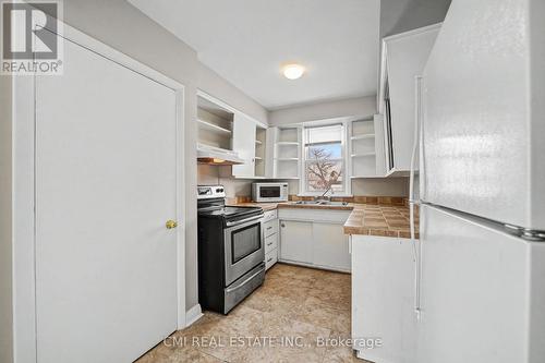 68 Queen Street S, Thorold, ON - Indoor Photo Showing Kitchen With Double Sink