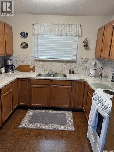 2108 Spruce Crescent, Turtle View, SK - Indoor Photo Showing Kitchen With Double Sink