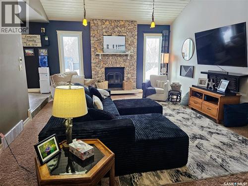 26 Barnes Crescent, Humboldt, SK - Indoor Photo Showing Living Room With Fireplace