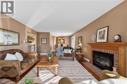 35 Highland Boulevard, Caledonia, ON - Indoor Photo Showing Living Room With Fireplace