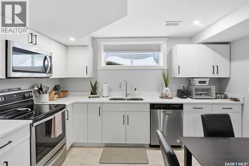 406 Chelsom Manor, Saskatoon, SK - Indoor Photo Showing Kitchen With Double Sink With Upgraded Kitchen