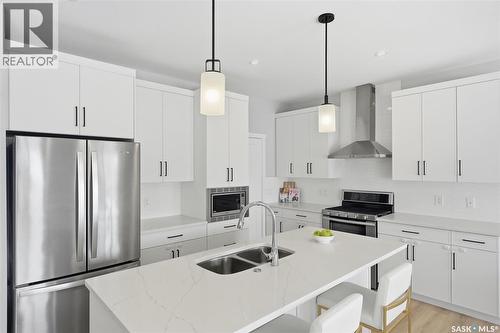 406 Chelsom Manor, Saskatoon, SK - Indoor Photo Showing Kitchen With Double Sink With Upgraded Kitchen