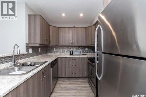 4311 108 Willis Crescent, Saskatoon, SK - Indoor Photo Showing Kitchen With Double Sink