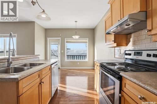 607 Beckett Crescent, Saskatoon, SK - Indoor Photo Showing Kitchen With Double Sink