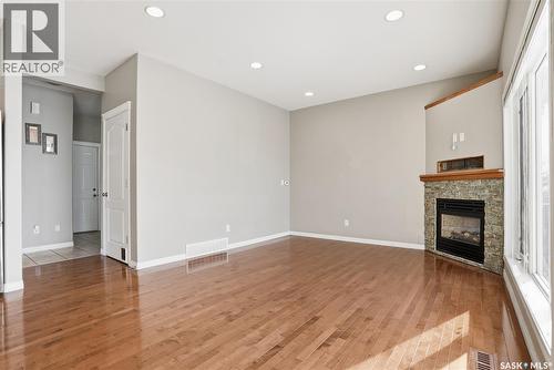 607 Beckett Crescent, Saskatoon, SK - Indoor Photo Showing Other Room With Fireplace