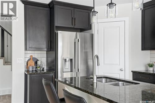 662 Sutter Bay, Saskatoon, SK - Indoor Photo Showing Kitchen With Double Sink With Upgraded Kitchen