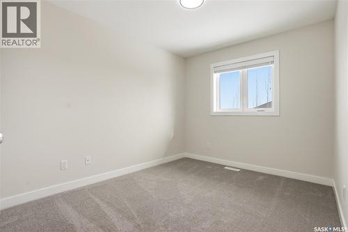 662 Sutter Bay, Saskatoon, SK - Indoor Photo Showing Other Room