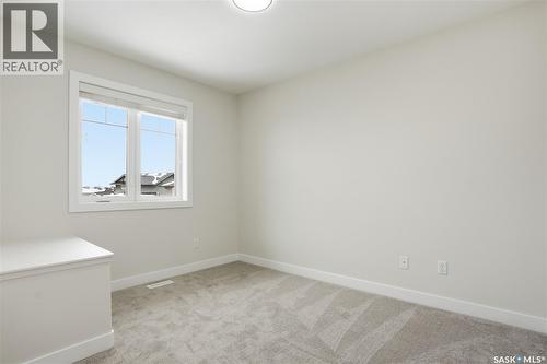 662 Sutter Bay, Saskatoon, SK - Indoor Photo Showing Other Room