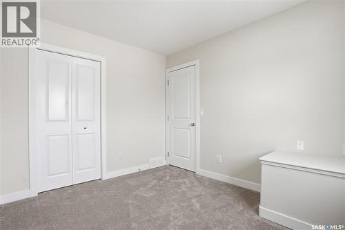 662 Sutter Bay, Saskatoon, SK - Indoor Photo Showing Other Room