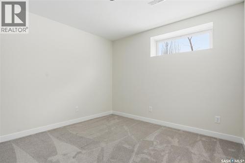 662 Sutter Bay, Saskatoon, SK - Indoor Photo Showing Other Room