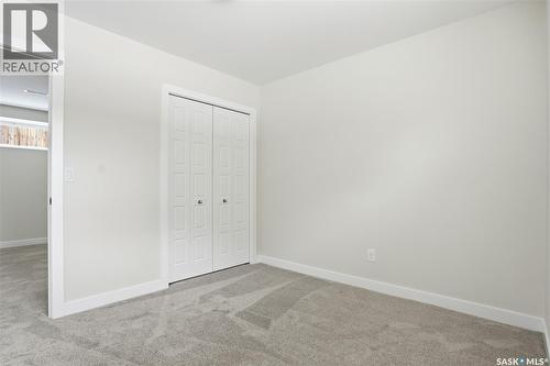 662 Sutter Bay, Saskatoon, SK - Indoor Photo Showing Other Room