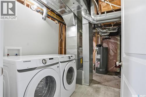 662 Sutter Bay, Saskatoon, SK - Indoor Photo Showing Laundry Room