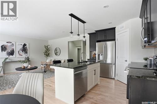 662 Sutter Bay, Saskatoon, SK - Indoor Photo Showing Kitchen With Upgraded Kitchen