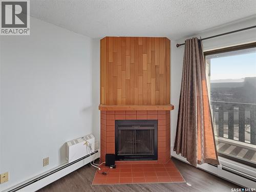301 1110 9Th Avenue Ne, Swift Current, SK - Indoor With Fireplace