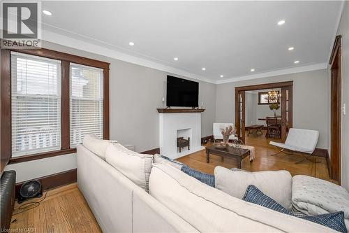 77 Proctor Boulevard, Hamilton, ON - Indoor Photo Showing Living Room With Fireplace