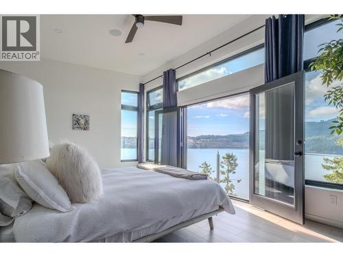 6101 -6099 Coracle Drive, Sechelt, BC - Indoor Photo Showing Bedroom With Body Of Water