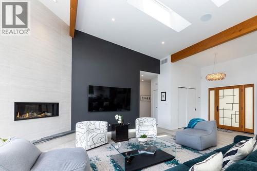 6101 -6099 Coracle Drive, Sechelt, BC - Indoor Photo Showing Living Room With Fireplace