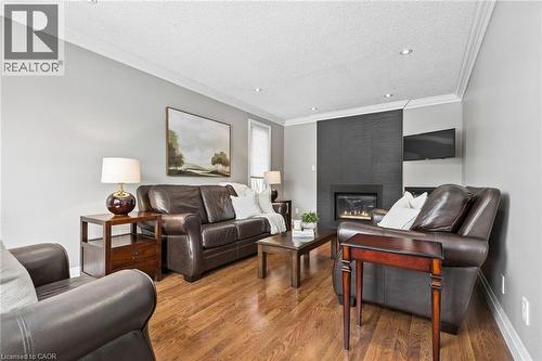 31 Cedar Crest Street, Kitchener, ON - Indoor Photo Showing Living Room With Fireplace