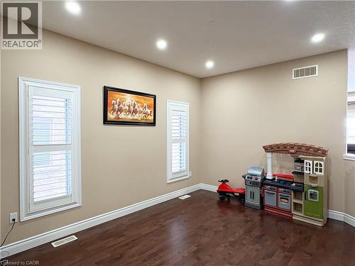 Rec room featuring dark wood-type flooring - 34 Watervale Drive Unit# Upper, Kitchener, ON - Indoor