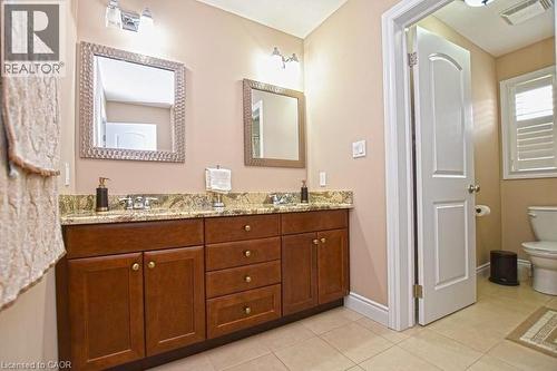 Bathroom with tile patterned floors, toilet, and vanity - 34 Watervale Drive Unit# Upper, Kitchener, ON - Indoor Photo Showing Bathroom