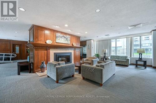 2502 - 530 Laurier Avenue W, Ottawa, ON - Indoor Photo Showing Living Room With Fireplace