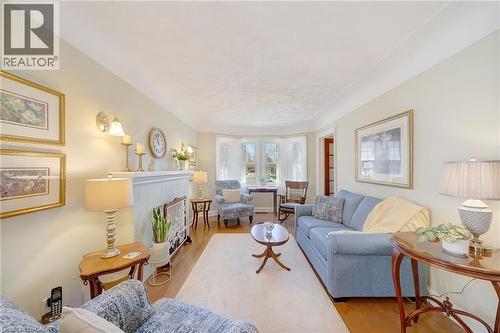 22 Churchill Avenue, Hamilton, ON - Indoor Photo Showing Living Room With Fireplace