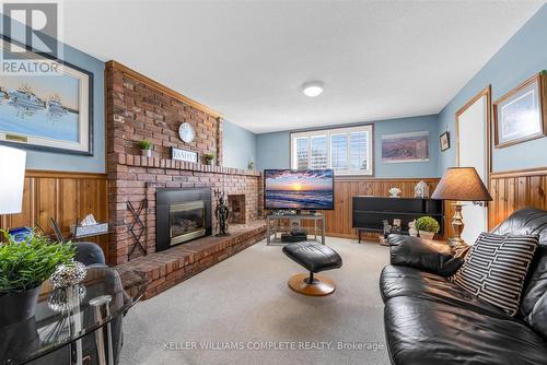 411 Bryant Crescent, Burlington, ON - Indoor Photo Showing Living Room With Fireplace