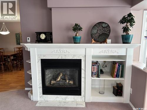 203 314 Nelson Road, Saskatoon, SK - Indoor Photo Showing Living Room With Fireplace