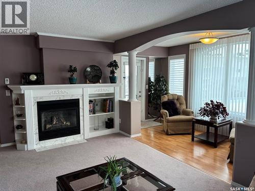 203 314 Nelson Road, Saskatoon, SK - Indoor Photo Showing Living Room With Fireplace