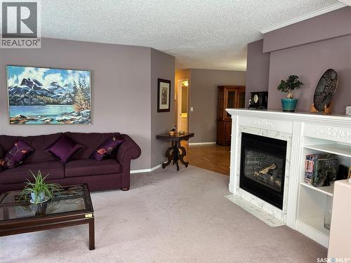 203 314 Nelson Road, Saskatoon, SK - Indoor Photo Showing Living Room With Fireplace