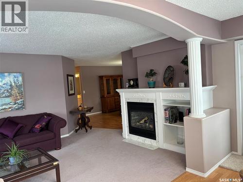 203 314 Nelson Road, Saskatoon, SK - Indoor Photo Showing Living Room With Fireplace