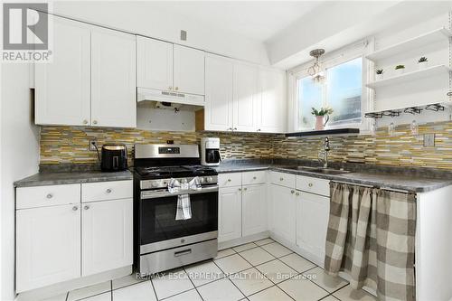 44 Holton Avenue N, Hamilton, ON - Indoor Photo Showing Kitchen With Double Sink