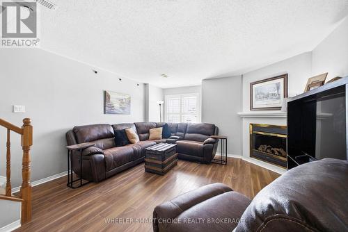 432 Hillsboro Private, Ottawa, ON - Indoor Photo Showing Living Room With Fireplace
