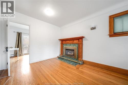 384 Detroit, Windsor, ON - Indoor Photo Showing Living Room With Fireplace