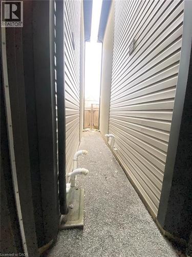 Garage door to rear yard - 72 Dodman Crescent, Ancaster, ON - Indoor Photo Showing Other Room