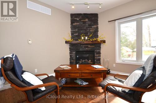 25 Rue Vanier, Tiny, ON - Indoor With Fireplace