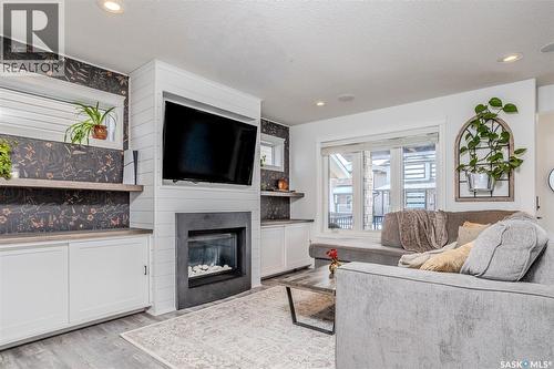 450 Kloppenburg Street, Saskatoon, SK - Indoor Photo Showing Living Room With Fireplace