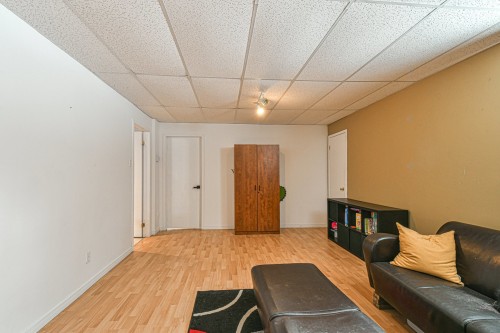 Salle familiale - 1751 Rue Philippe, Prévost, QC - Indoor Photo Showing Other Room With Fireplace