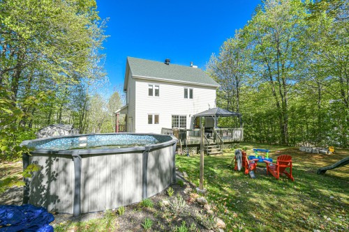 Face arrière - 1751 Rue Philippe, Prévost, QC - Outdoor With Above Ground Pool