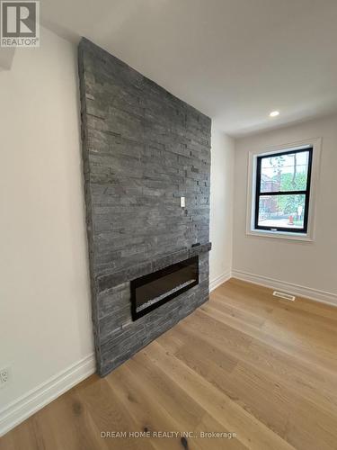 Upper - 9 Rusholme Drive E, Toronto, ON - Indoor Photo Showing Other Room With Fireplace