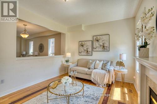 3 Hesham Drive, Whitby, ON - Indoor Photo Showing Living Room With Fireplace