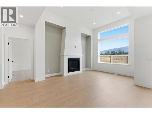 2468 Bradley Drive, Armstrong, BC - Indoor Photo Showing Living Room With Fireplace