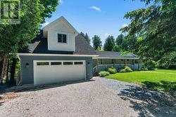 Self Contained Bunkie Over Two Car Garage - 