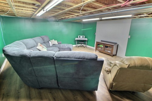 Cinéma maison - 1801 1Re Rue E., Amos, QC - Indoor Photo Showing Basement